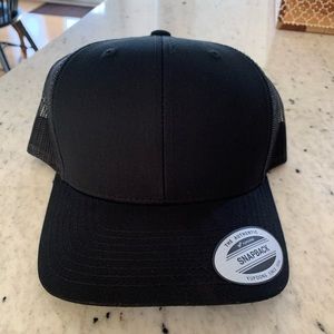 Brand new black trucker SnapBack.